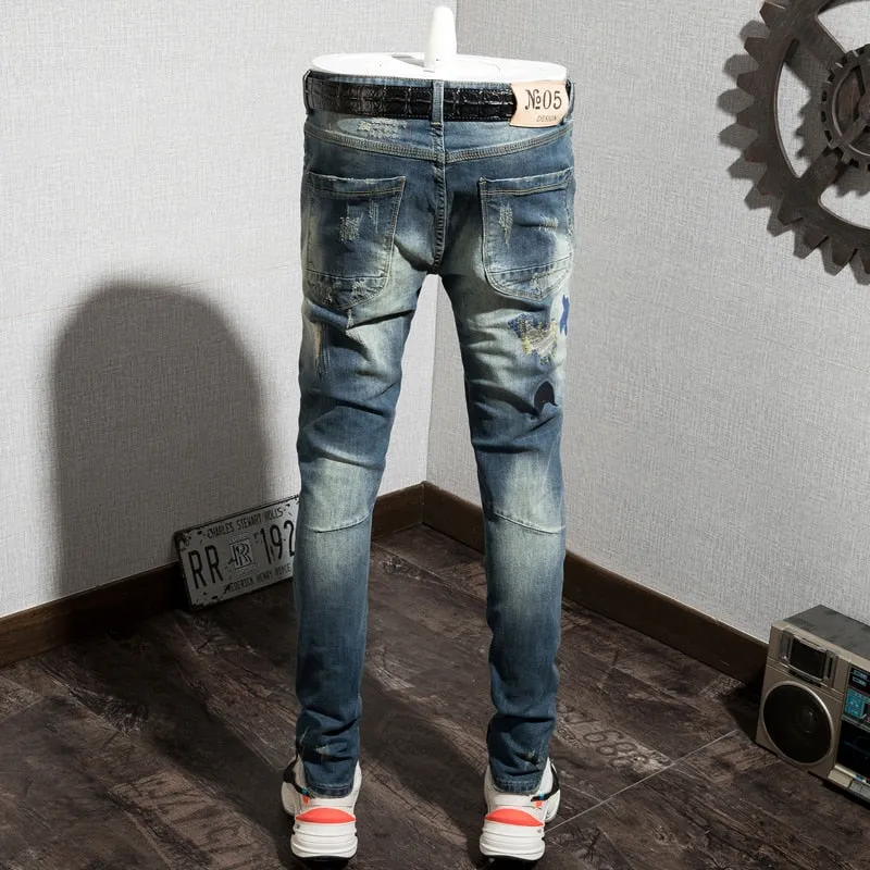 Distressed Holes with Mixed Colored Shapes Patched Men Jeans